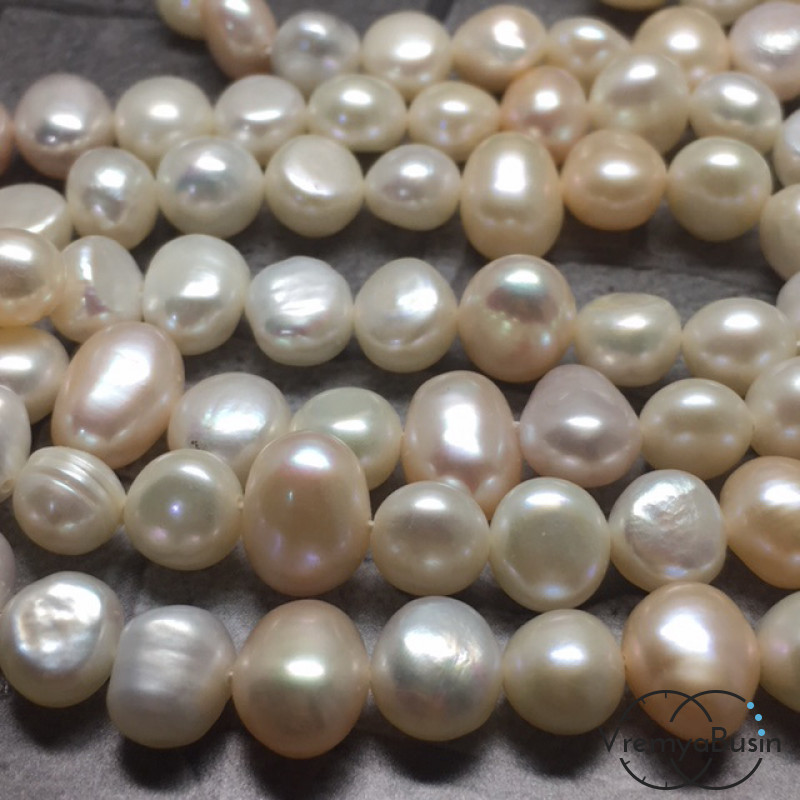 Жемчуг натуральный речной, бело-кремовый овальный ок.7х9 мм (1 шт.)