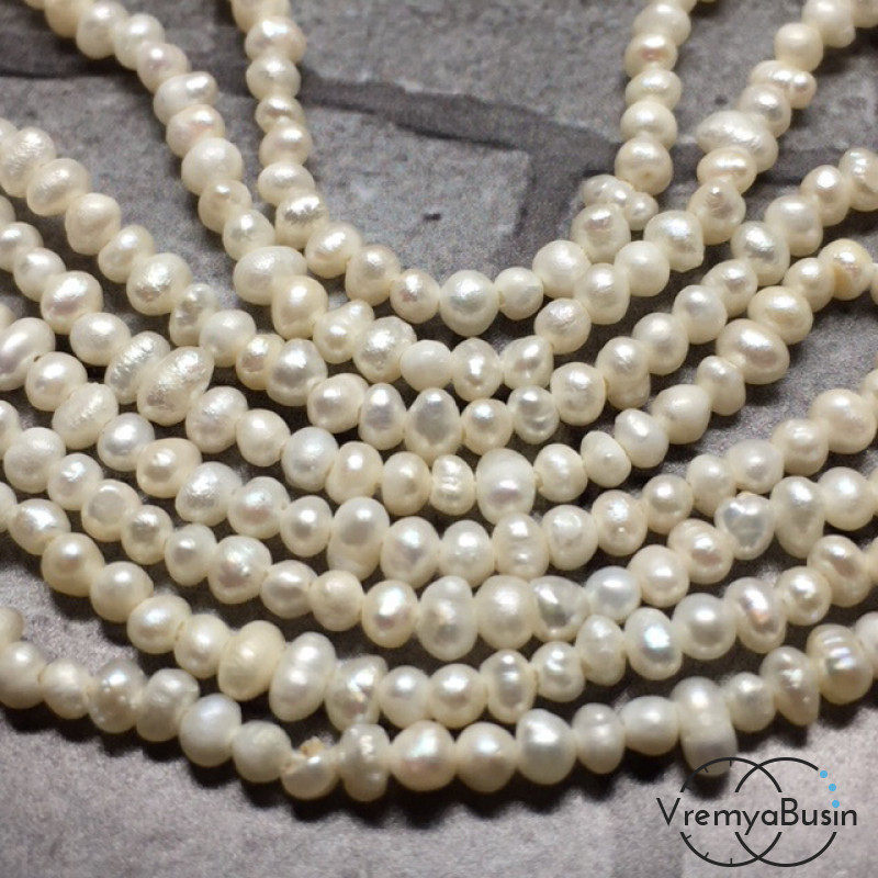 Жемчуг натуральный речной, белый округлый ок.2 мм (1 шт.)