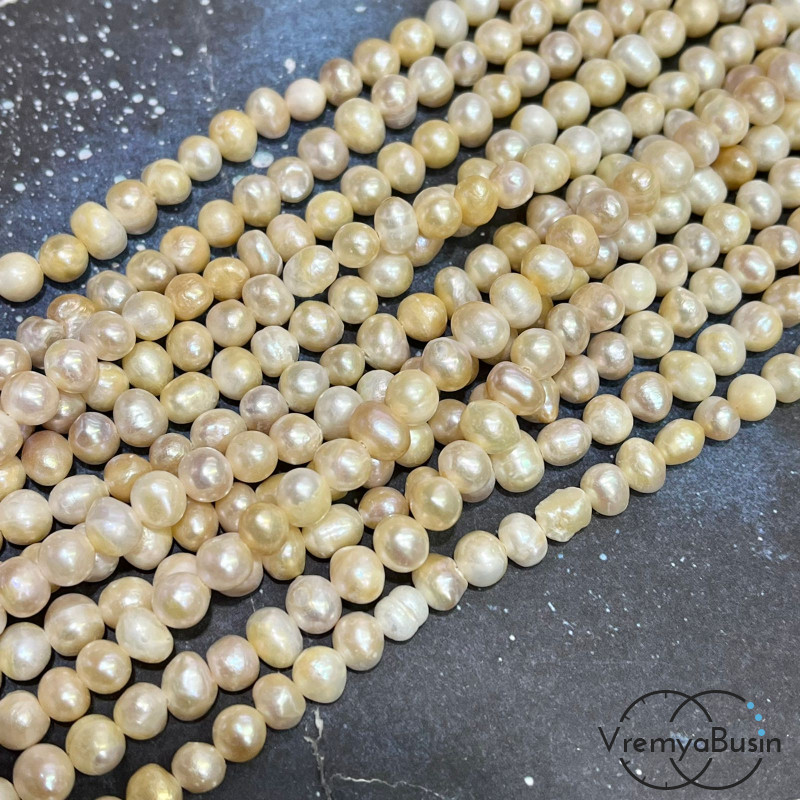 Жемчуг натуральный речной, округлый ок. 7 мм (нить, ок. 60 шт.)