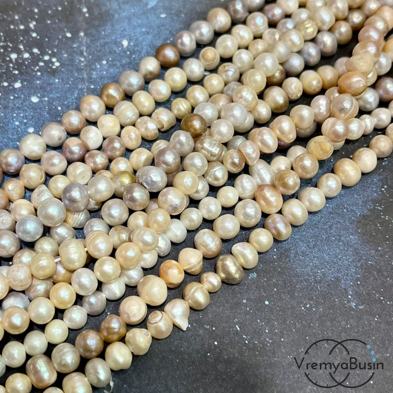 Жемчуг натуральный речной, округлый ок. 7 мм (нить, ок. 60 шт.)