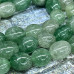 Авантюрин зеленый, галтовка округлая ок. 12х16 мм (1/2 нити, ок.  14  шт.)