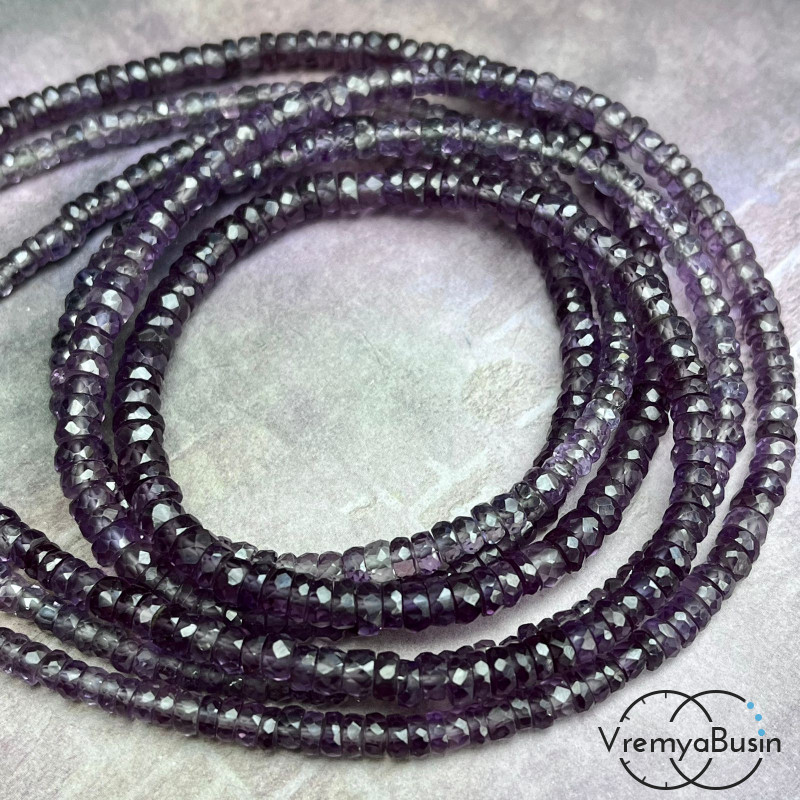 Александрит синт. рондель ювелирной огранки, разм. от 2х3 до 3х5 мм (1/2 нити, ок. 20 см.)