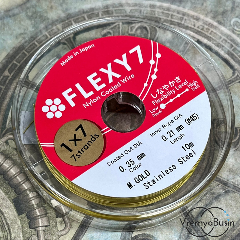 Японский стальной тросик Flexy7 в нейлоновой оплетке, 0.35  мм, цв. GOLD  (катушка 10 м.)